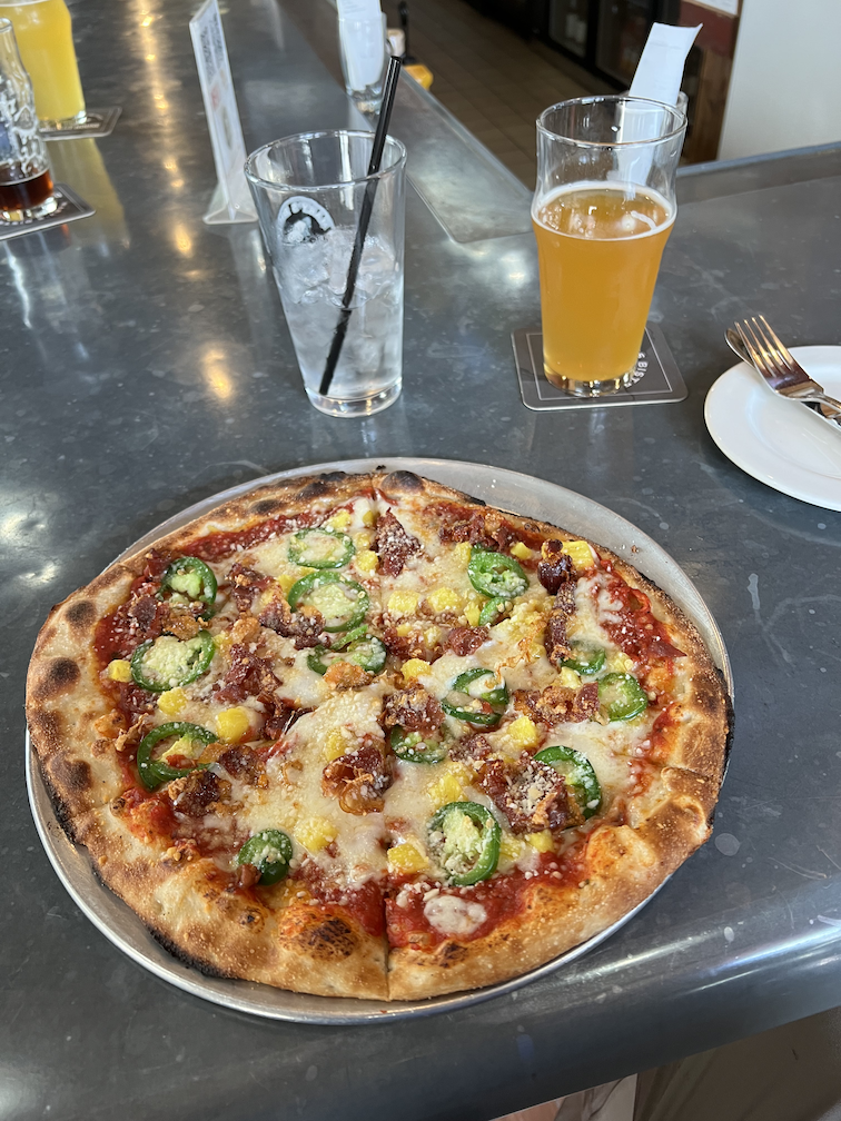 Mary’s Bistro Hawaiian pizza and Austin Brothers Woody Wheat beer