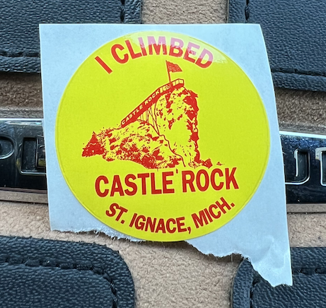 Sticker that says “I climbed Castle Rock St. Ignace, Mich.”